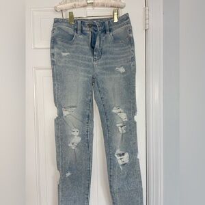 american eagle skinny jeans light wash with rips- size 24